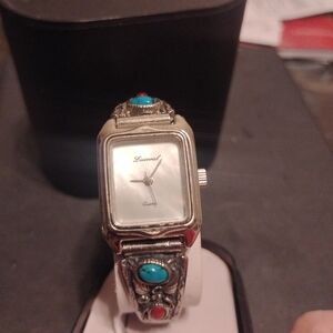 Lucoral Elegant Silver Smartwatch with Turquoise and Red Coral Accents